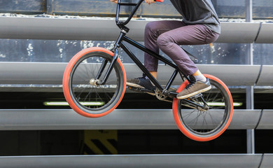 Obraz na płótnie Canvas cyclist jump on bicycle