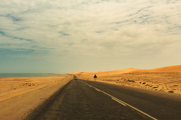 view from the road to the African dunes in the desert near the o