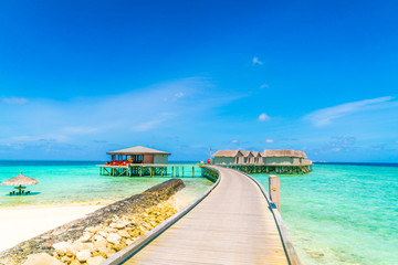 Beautiful water villas in tropical Maldives island  .