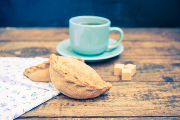 pie and tea on a table, selective focus, the image it is tinted