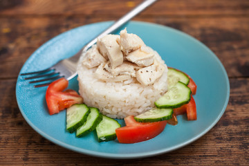 chicken fillet with rice and vegetables, selective focus, the image is tinted