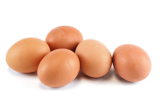 fresh chicken eggs isolated on white background