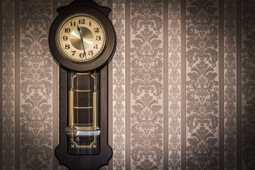 Wall clock with pendulum