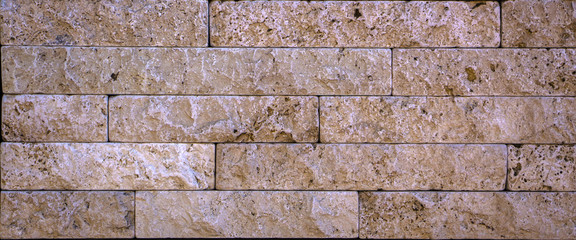 Orange facing stone, slate, sandstone and travertine marble