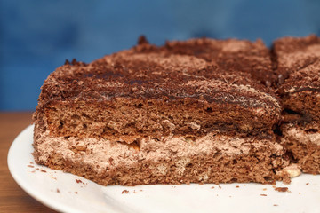 Slices of chocolate cake with cream closeup