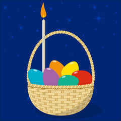 Easter basket with eggs and candle