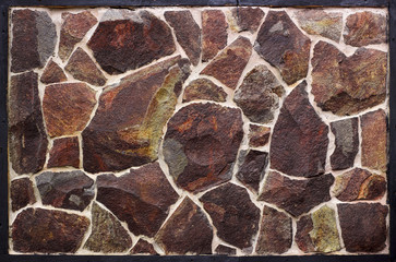 orange wall of a wild stone close-up