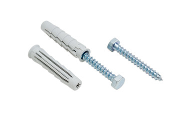 Two lag bolts and two screw anchors on light background