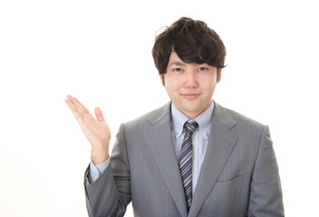 案内するビジネスマン