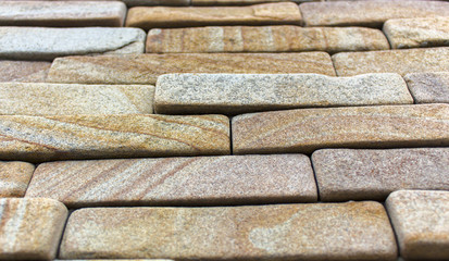 Wall of Indian sandstone, with a beautiful structure, decorative building, facing material