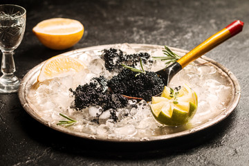 Black caviar in spoon