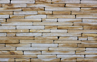 Wall of Indian sandstone, with a beautiful structure, decorative building, facing material