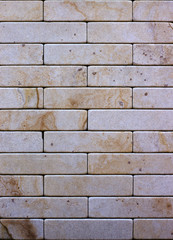 Wall of Indian sandstone, with a beautiful structure, decorative building, facing material