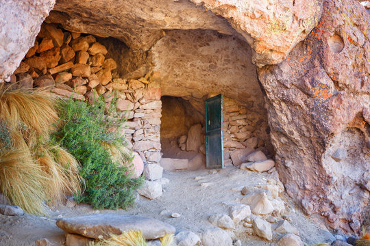 Cave cemetery chullpas with several mummies, Coqueza, Tunupa volcano, in the Uyuni salt flat, Bolivia
