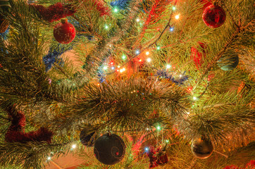 Obraz na płótnie Canvas decorated Christmas tree with lighted garland