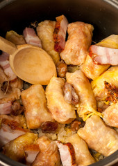     stuffed cabbage meat rolls romanian sarmale, raw meat, cabbage, bacon, dill, pepper, laurel waiting to be cooked 