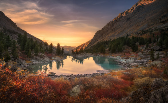 Pink Sky And Mirror Like Lake On Sunset With Red Color Growth On Foreground, Altai Mountains Highland Nature Autumn Landscape Photo © photoprime