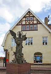 Fototapeta na wymiar Sculpture of Archangel Michael in Mora. Sweden