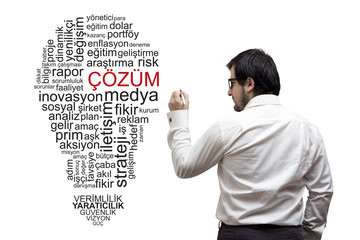 Businessman is writing on board