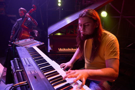 The musician at the rehearsal.