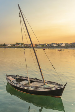 Dorna sailboat at dusk