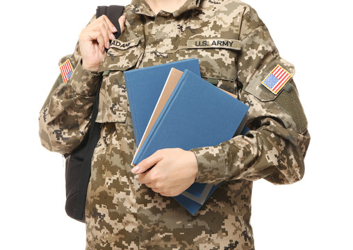 Pretty female cadet of military school on white background, closeup
