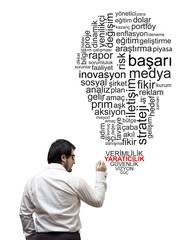 Businessman is writing on board