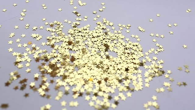 Christmas golden shiny stars konfetti are falling