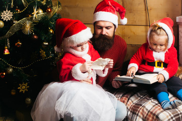 Fototapeta na wymiar christmas bearded father and children