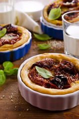 Open pies with dried tomatoes