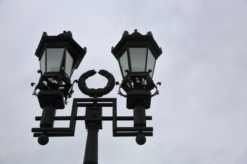 Vintage black lantern on a city street