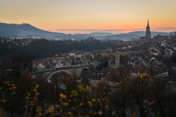 A cityscape of Bern, medival city in Switzerland in the late evening with a soft fog.