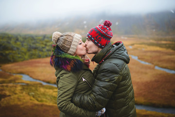Kissing Couple in Orange Field