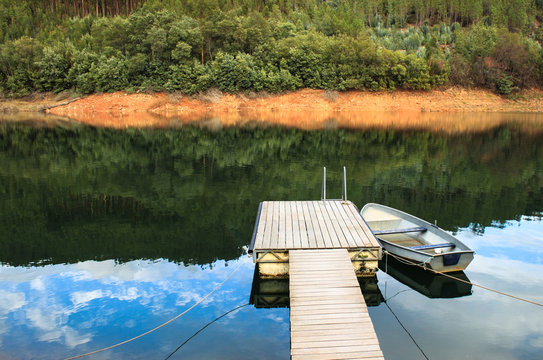 Boat in a small pier in a lake