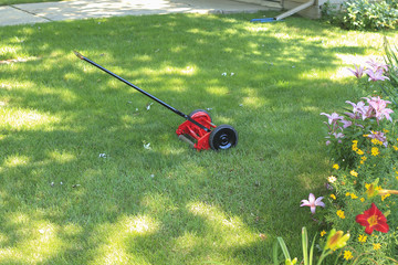 new old tool a restored lawnmower