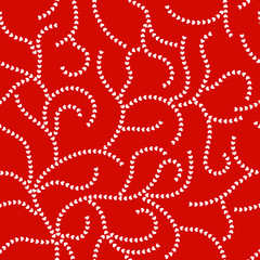 Openwork wicker seamless pattern of white hearts on a red background. Suitable for decoration of greeting cards for Valentine's day and design backgrounds.