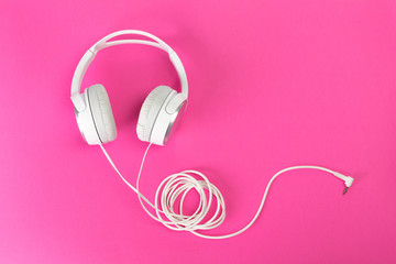 headphones on pink background