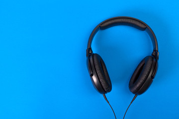 Headphones on blue background