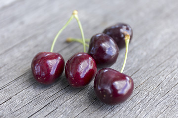 Fresh cherry on old wooden