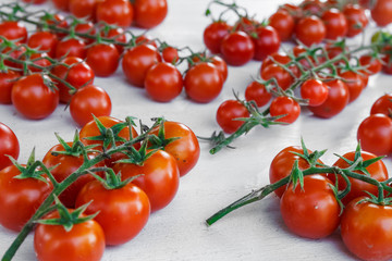 Cherry tomatoes on a white background.