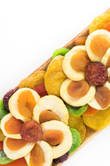 Assorted dried fruits plate.