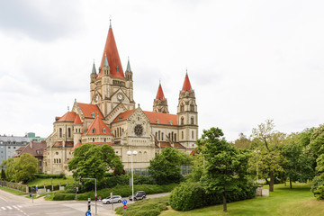 Fototapeta premium Church heiliger franz of assisi at mexikoplatz on danube river, vienna, austria