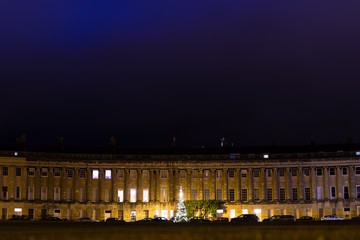 Fototapeta na wymiar Royal Crescent in Bath with Christmas Tree. A section of the historic and beautiful building in UNESCO World Heritage City in Somerset, England, UK