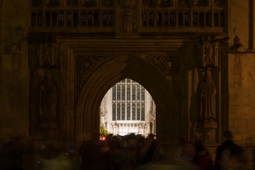 Congregants leaving Christmas Midnight Mass at Bath Abbey. Hundreds of people leave religious...
