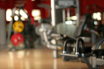 Fototapeta na wymiar Gym interior, blurred background