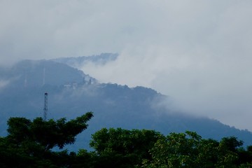 Mountain & Temple In North Thailand Covered In Clouds