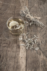 sage tea on wooden table