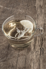 sage tea on wooden table
