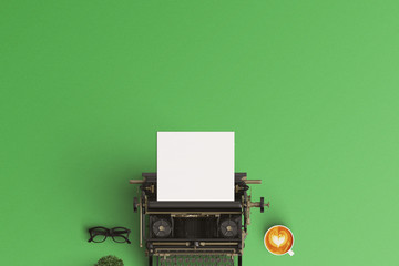  vintage typewriter paper and cup of coffee latte art on the col