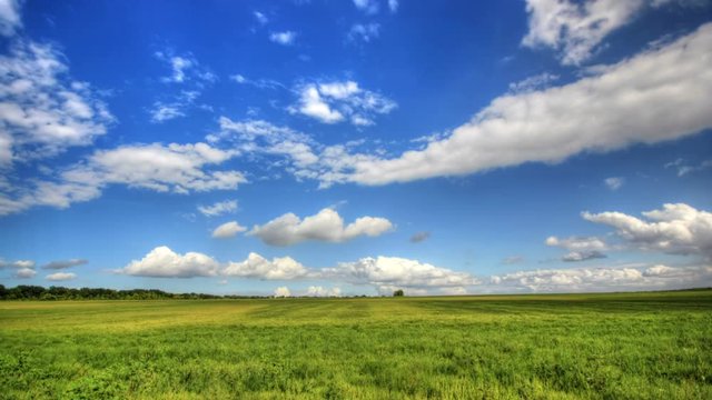 Timelapse summer landscape with clouds.